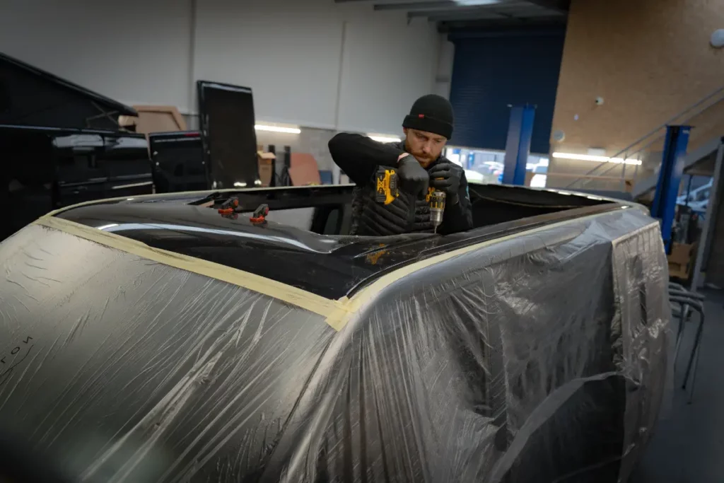 Ford Transit Custom pop top installation by cosmic campervan professionals